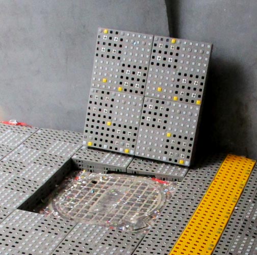 Rampe componibili per disabili Milano: dettaglio rampa zona tombino